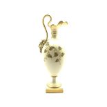 Royal Worcester blush ivory ewer the base of the handle decorated with a satyr mask and decorated wi