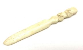 Japanese Meiji period ivory letter opener, the handle carved in high relief with fruiting foliage, L