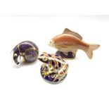 Royal Crown Derby 'Golden Carp' paperweight and two others 'Frog' and 'Badger' all without stoppers