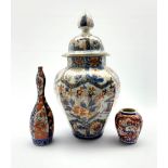 Japanese Imari pattern vase and cover of panel sided design decorated in orange blue and gilt H43cm