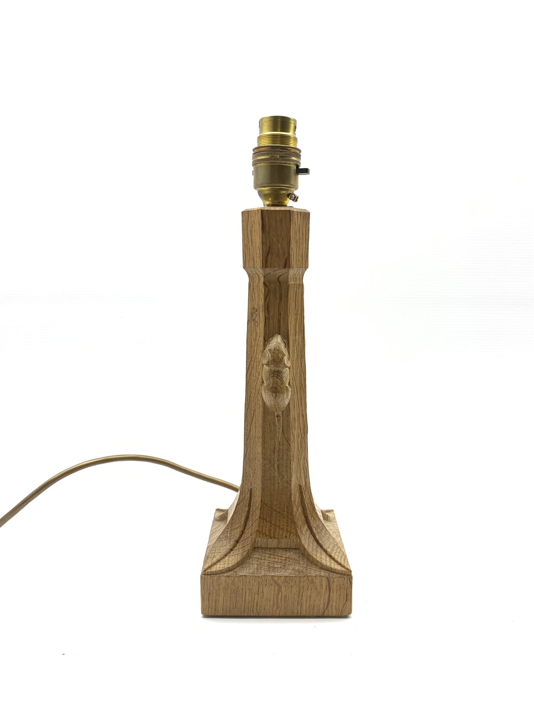 Thompson of Kilburn 'Mouseman' adzed oak table lamp with octagonal stem on a leaf carved square base