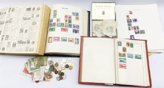 Great British and world stamps and coins including USA five dollar note and small number of USA coin
