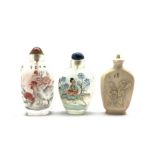 Two Chinese inside-painted glass snuff bottles, together with an early 20th century ivory snuff bott