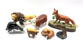 Six Beswick models comprising: Trout 1390, Lion 2554b, Hereford Bull 1363a first version, Curled Fox