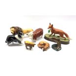 Six Beswick models comprising: Trout 1390, Lion 2554b, Hereford Bull 1363a first version, Curled Fox