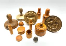 Four various 19th century treen butter stamps