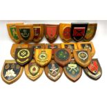 Twenty-one wall plaques, many relating to the Military including '3rd Bn. Light Infantry', 'Gurkha F