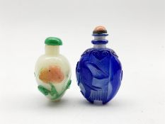 Chinese Peking glass snuff bottle decorated in blue glass overlay with an Elephant and coral coloure