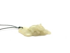 Chinese carved jade leaf shaped pendant detailed with a recumbent Cat