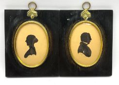 R Kipps - Pair of 19th century silhouette profile portraits of a lady and gentleman with gilt highli