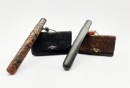 Japanese Meiji tobacco pouch (tabako-ire) with metal mae-kanagu, stained wooden ojime bead and black