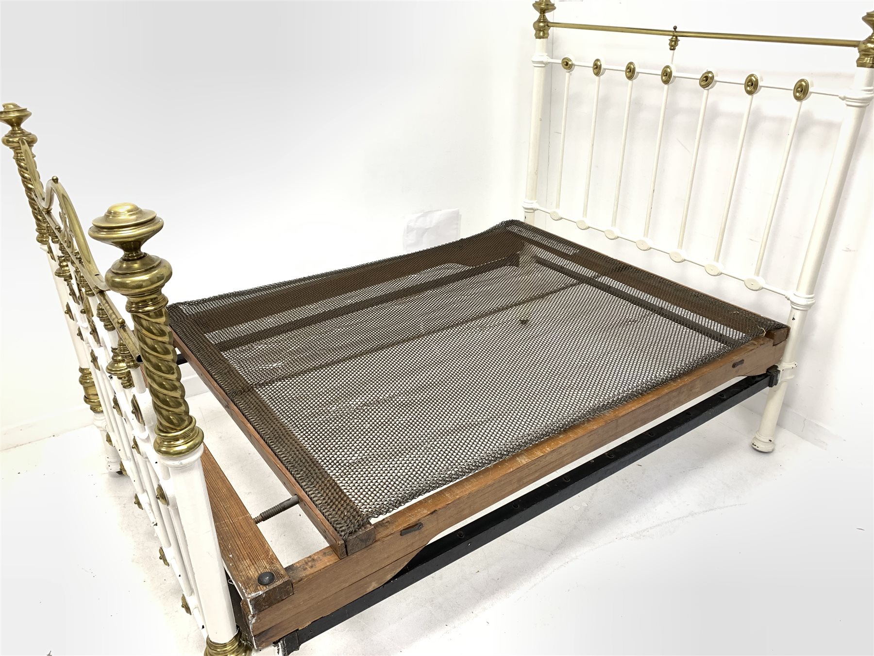 Victorian white painted iron and brass double bedstead, with cast spiral and leaf decoration, raised - Image 5 of 5
