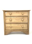 Edwardian satin walnut chest fitted with three long graduated drawers, raised on bracket supports