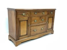 Edwardian walnut sideboard, fitted with five drawers and two cupboards