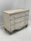 Victorian painted pine three drawer chest, with shaped apron and turned supports