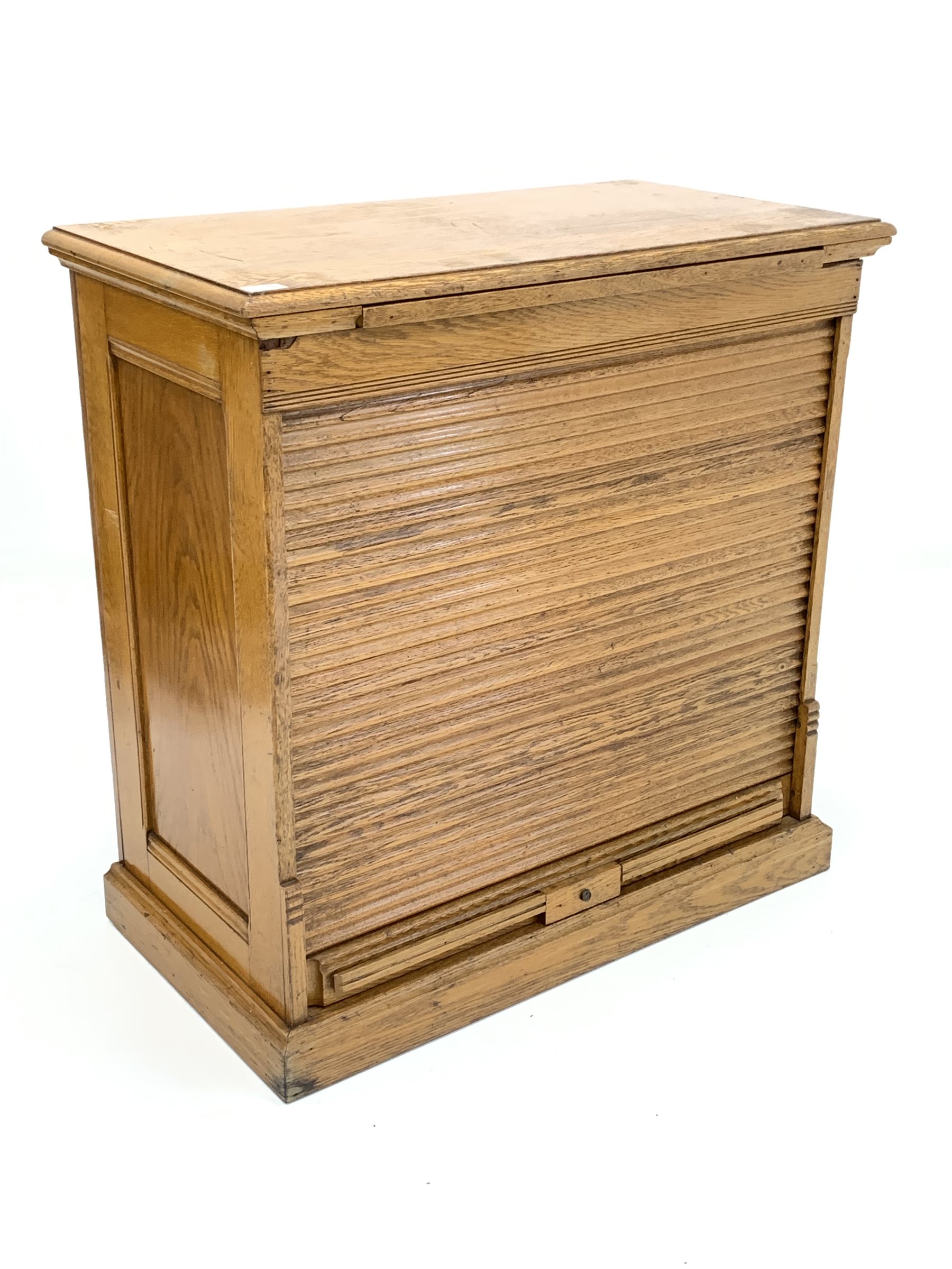 Early 20th century tambour front filing cabinet, moulded rectangular top over slide and lifting tamb