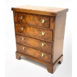 George III style burr walnut bachelors chest, moulded hinged fold over top over three long drawers,