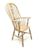 19th century stripped ash and elm Windsor armchair, hoop, spindle and splat back, shaped saddle seat