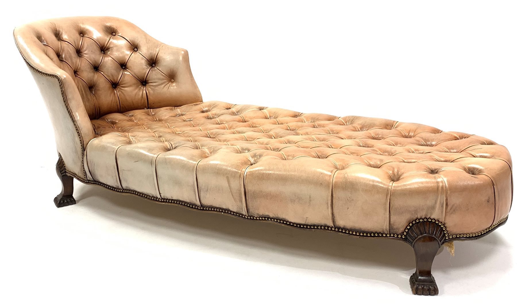 Georgian style chaise longue, with tub shaped raised back rest, upholstered in deep buttoned and stu