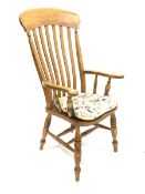 20th century beech and elm farmhouse chair, shaped saddle seat over ring turned supports united by d