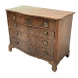 Georgian well figured mahogany serpentine front chest, the moulded cross banded top over brushing sl