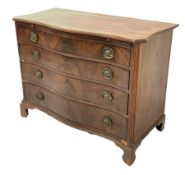 Georgian well figured mahogany serpentine front chest, the moulded cross banded top over brushing sl