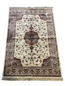 Kashmir full pile rug with bespoke floral medallion on gold field