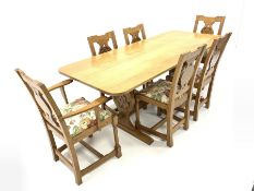 Yorkshire oak dining suite, comprising oak dining table, the rectangular top raised on shaped panel