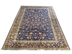 Persian Kashan ground carpet, the blue field with all over design centred by Herati motif, guarded b