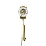 Hermle brass skeleton weight driven wall clock, eight day movement with passing strike to exterior b