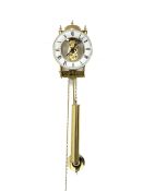 Hermle brass skeleton weight driven wall clock, eight day movement with passing strike to exterior b