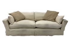 Large contemporary three seat sofa, with loose cushions and cover, upholstered in natural linen