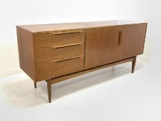 McIntosh & Co Ltd - Mid 20th century teak sideboard, fitted with double cupboard enclosing shelves,