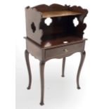 Edwardian mahogany bedside table, the raised, shaped and pierced back with open shelf over one drawe