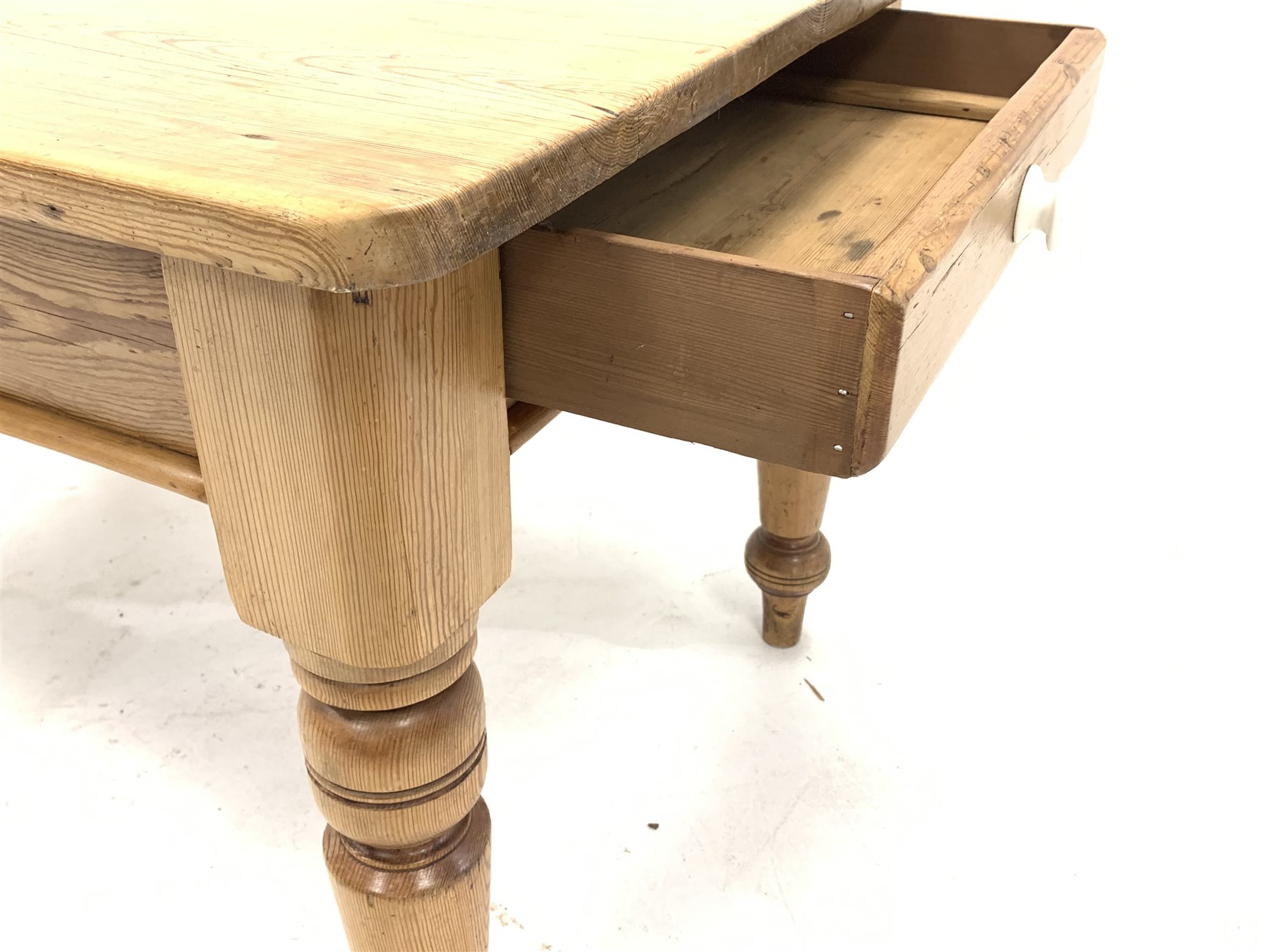 Victorian pine kitchen dining table, fitted with one drawer with ceramic pull handle, raised on turn - Image 2 of 4