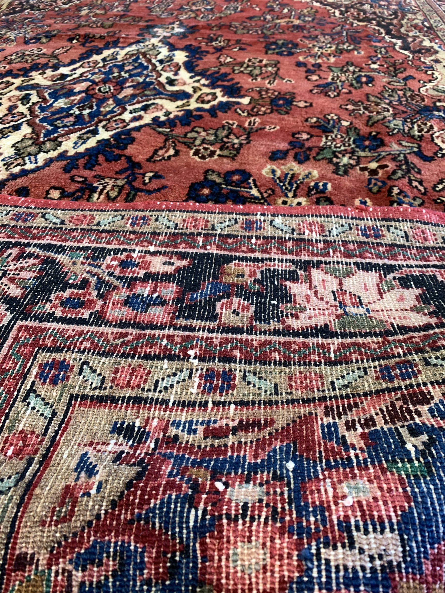 Persian Sarouk full pile red ground Persian Sarouk carpet, with floral medallion 305cm x 200cm - Image 3 of 3