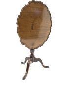 George III mahogany tripod table, circular moulded pie crust tilt top on turned column, three out sp