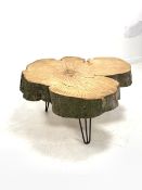 Naturalistic live edge coffee table, the beech top raised on hairpin supports