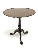 20th century Georgian style mahogany tripod table, circular moulded pie crust tilt top on turned and