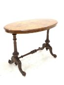Victorian burr walnut oval centre table, the moulded quarter sawn veneered top raised on two turned,