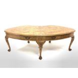 Large early to mid 20th century Georgian style walnut kidney shaped library table, the cross banded