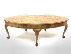 Large early to mid 20th century Georgian style walnut kidney shaped library table, the cross banded