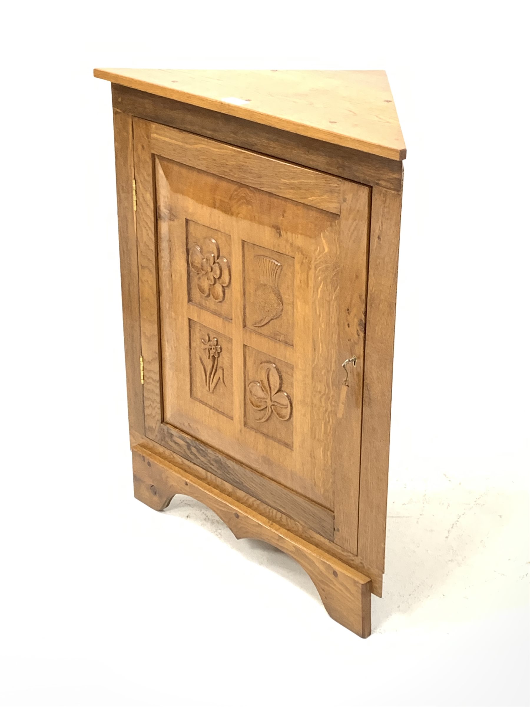 Yorkshire oak floor standing corner cupboard, with sngle fielded panelled door carved with floral de - Image 2 of 3