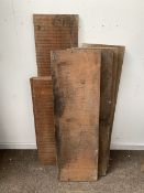 Nine boards of mainly African mahogany, the smallest measuring 100cm x 35cm x 3cm