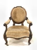 Victorian mahogany open armchair, leaf carved crest rail over scrolled arm rests and shaped apron, u