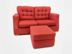 Contemporary two seat sofa, upholstered in red linen, with buttoned loose cushions, raised on beech
