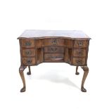 18th century walnut and oak serpentine lowboy, the cross banded, herringbone inlaid and moulded top