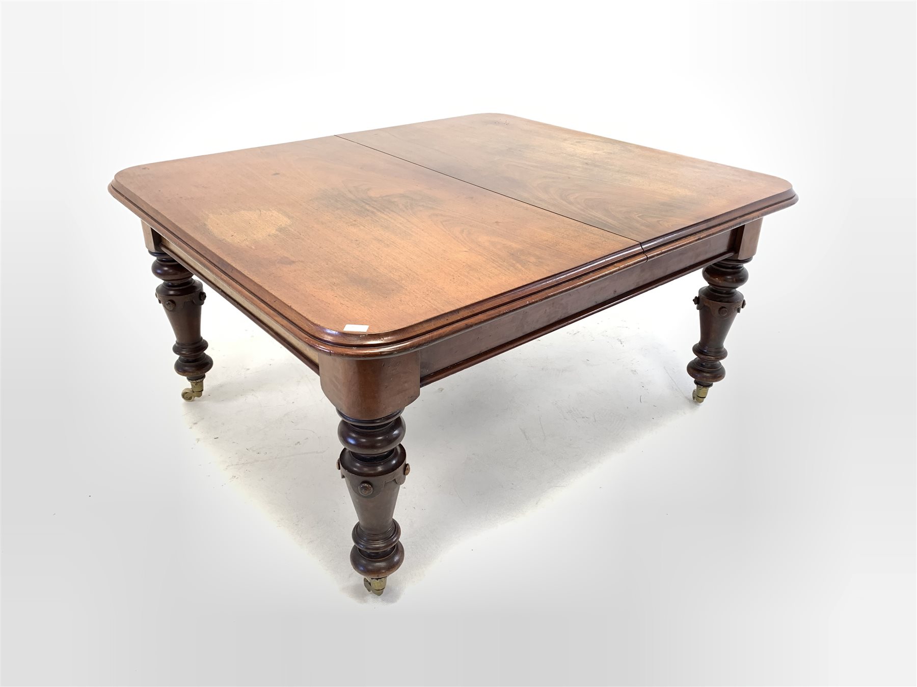 Large Victorian mahogany wind out extending dining table, the rectangular moulded top with rounded c - Image 7 of 7