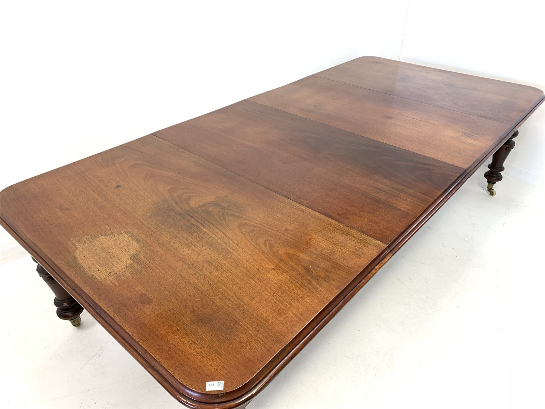 Large Victorian mahogany wind out extending dining table, the rectangular moulded top with rounded c - Image 3 of 7