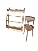 20th century mahogany wall hanging three tier rack, with peirced panel ends, serpentine front and th